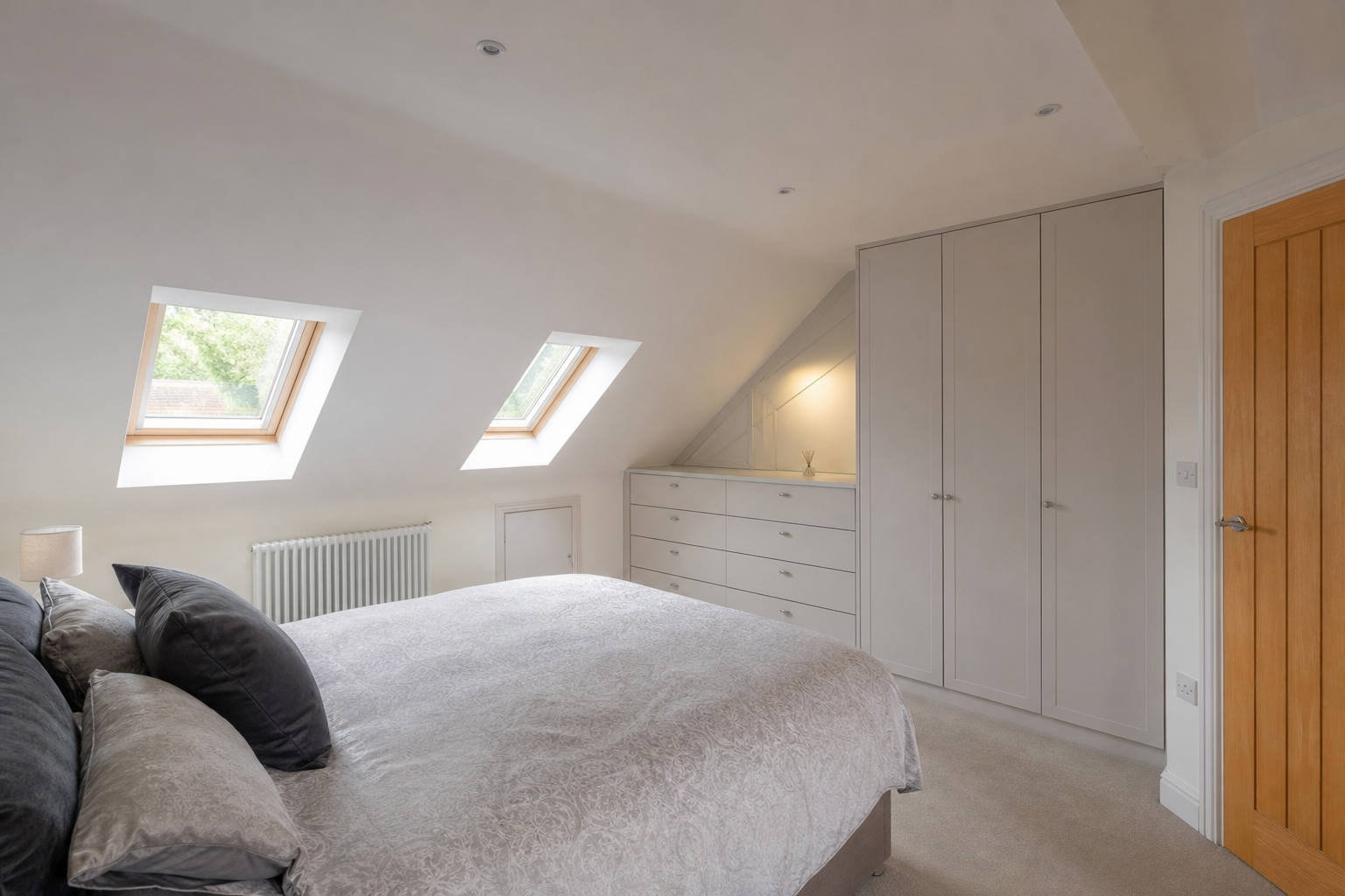 Interior view looking towards the Velux rooflights from the bed