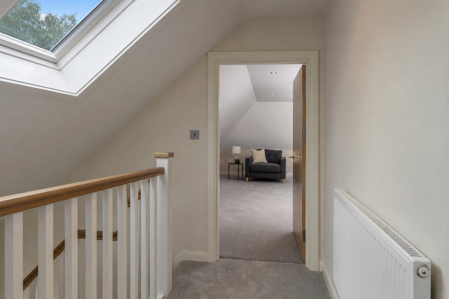 Loft staircase landing threshold at the Hitchin conversion